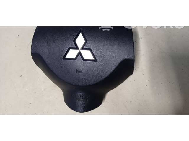 Подушка безопасности водителя 7030A088XA Mitsubishi Outlander