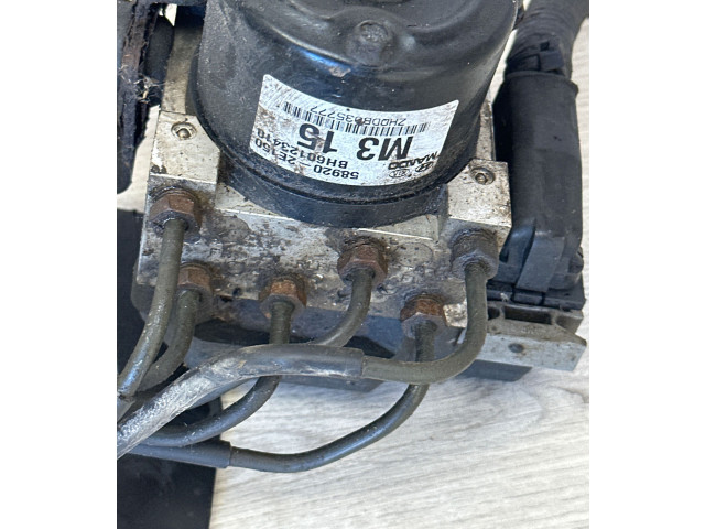 Jednotka ABS 589202E150, BH60123410   Hyundai Tucson JM 2006