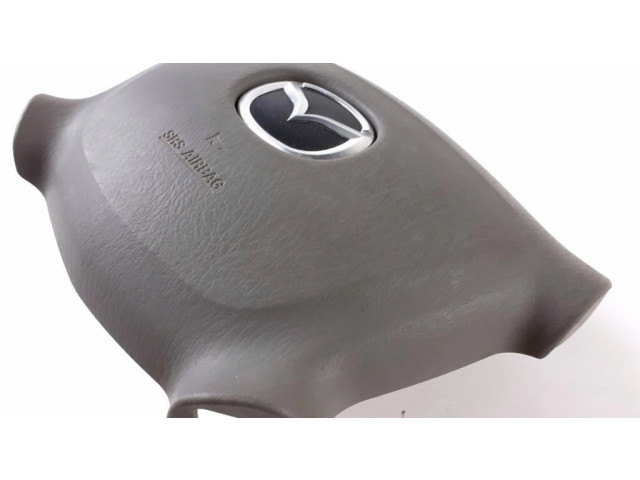 Подушка безопасности водителя LC6357K0005, T93141A Mazda Premacy