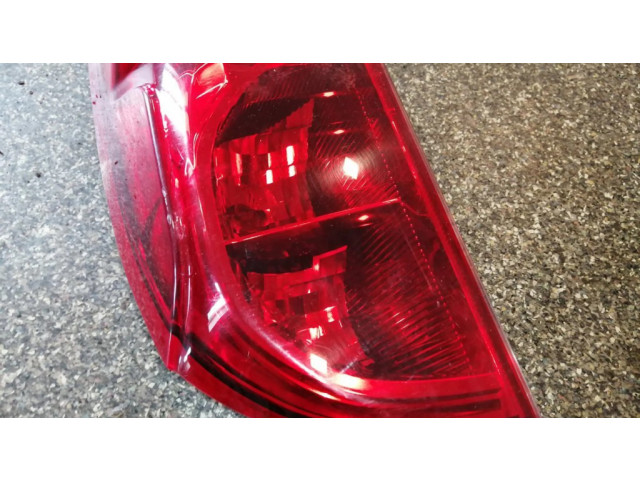 Задний фонарь левый 00518106740 Fiat Doblo 2010-2022 года