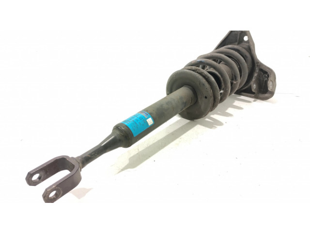 Передний амортизатор с пружиной      