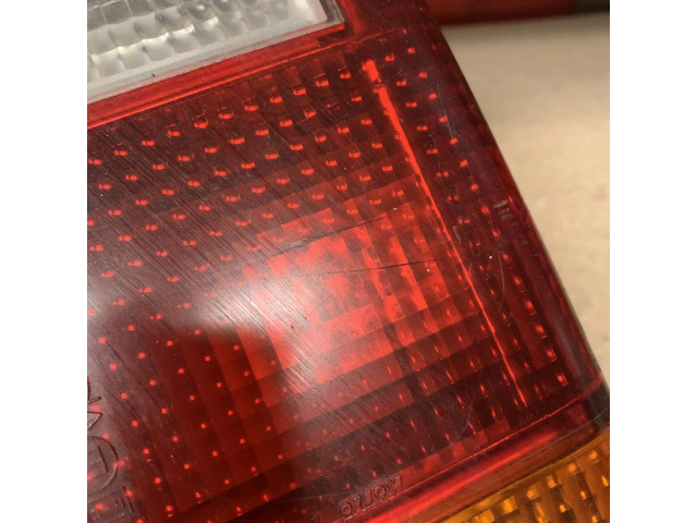 Задний фонарь левый сзади 22037445 Mitsubishi L300, Cosmos