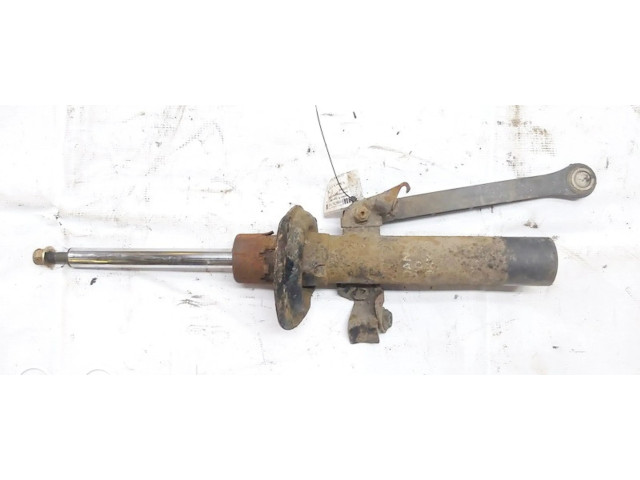 Передний амортизатор