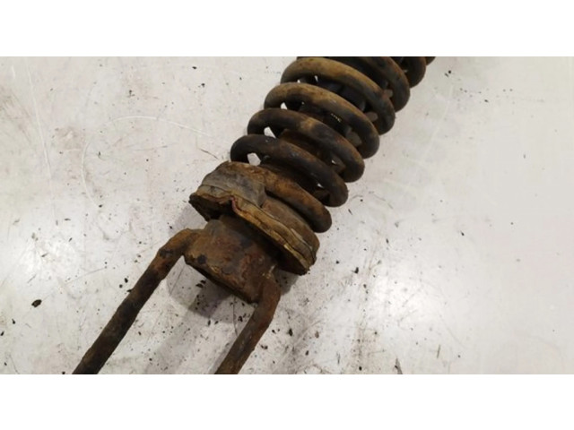 Передний амортизатор с пружиной