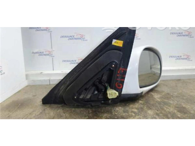 Zpětné zrcátko  KIA Shuma 1998    