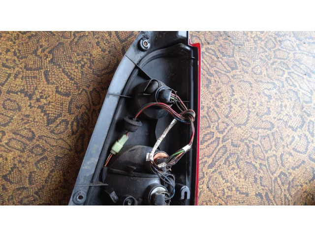 Задний фонарь левый сзади 09204255, 301311    Opel Agila A   2000-2007 года