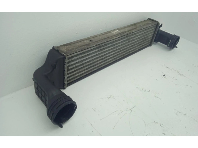 Интеркулер  77897930, 77897930   BMW X3 E83 