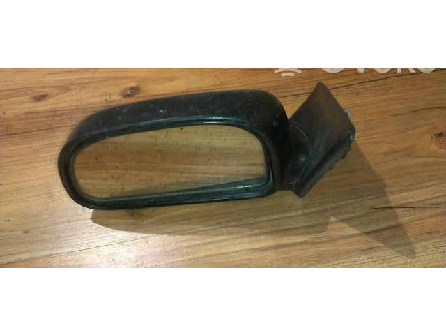 Зеркало электрическое левое Mitsubishi Colt 1992-1996 года