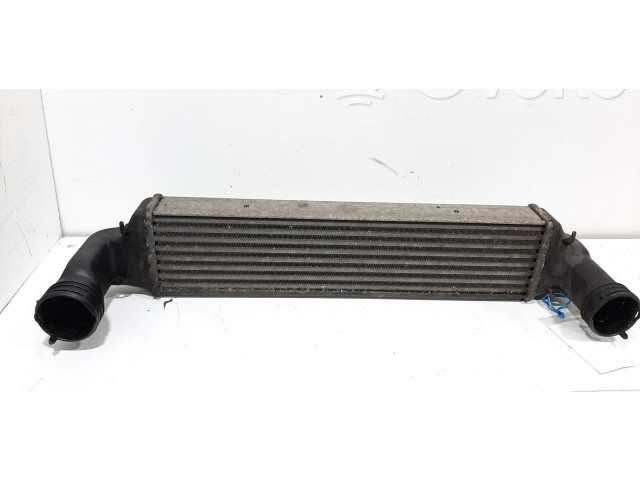 Интеркулер  1787779, 7789793   BMW X3 E83 