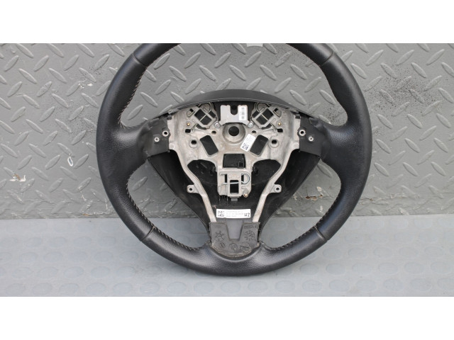 Volant Nissan Note (E12) 2013