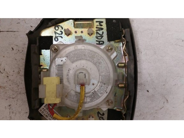 Подушка безопасности водителя G54M57K0004, T93106A Mazda 626