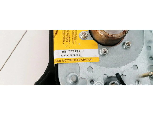 Подушка безопасности водителя MR777231 Mitsubishi Carisma