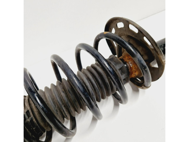 Передний амортизатор с пружиной      