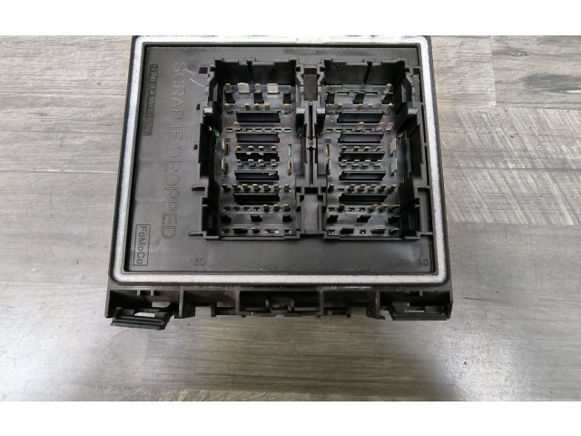 Блок предохранителей 2431807, JX6T-14D068-EDB   Ford Focus    