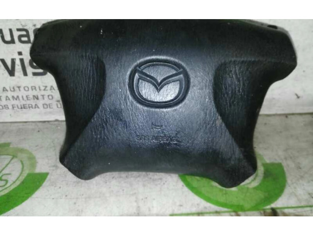 Подушка безопасности водителя A11933769072, 0110009   Mazda 323