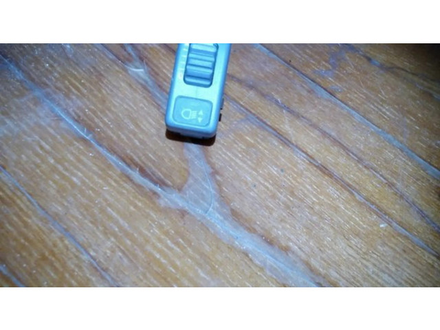 Включатель регулировки высоты фонарей