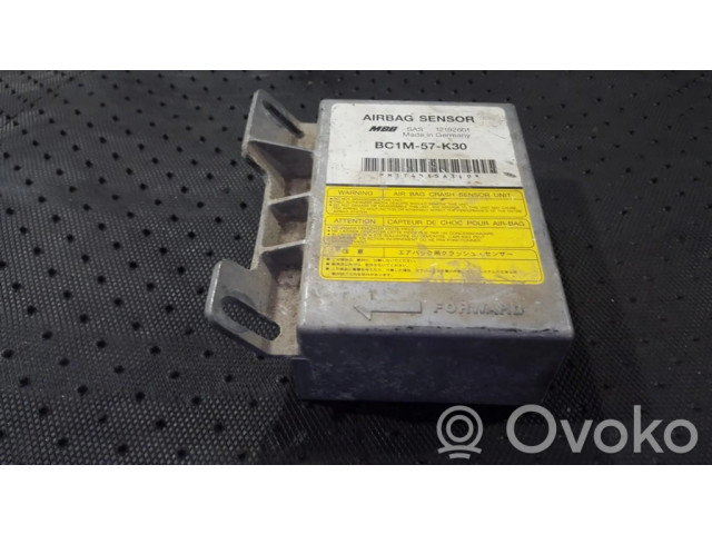 Блок подушек безопасности 12192601, BC1M-57-K30   Mazda 323