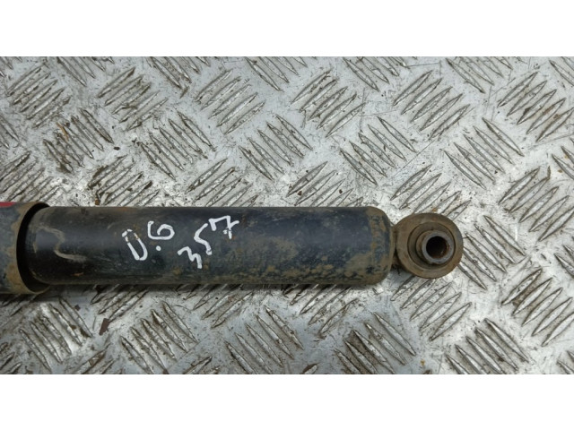 Задний aмортизатор