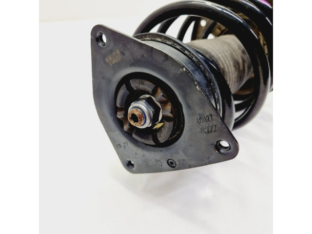 Передний амортизатор с пружиной      