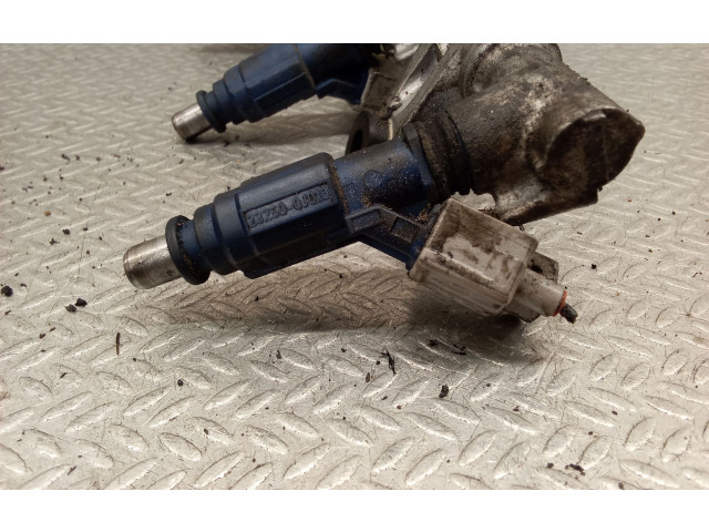 Vstřikovač 232500J010 Toyota Yaris -