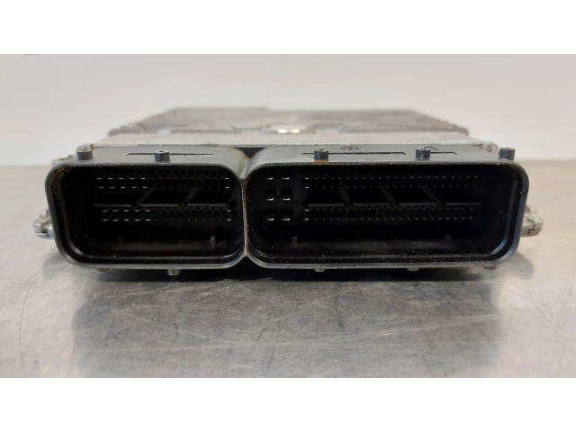 Блок управления двигателя 03L906023QA   Audi A1