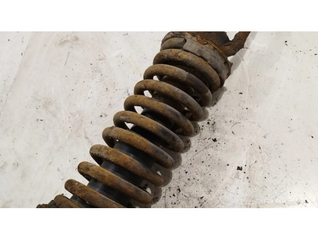 Передний амортизатор с пружиной