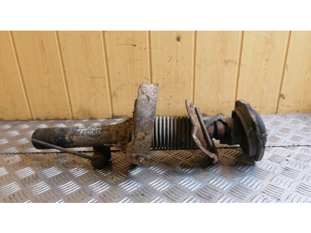 Передний амортизатор