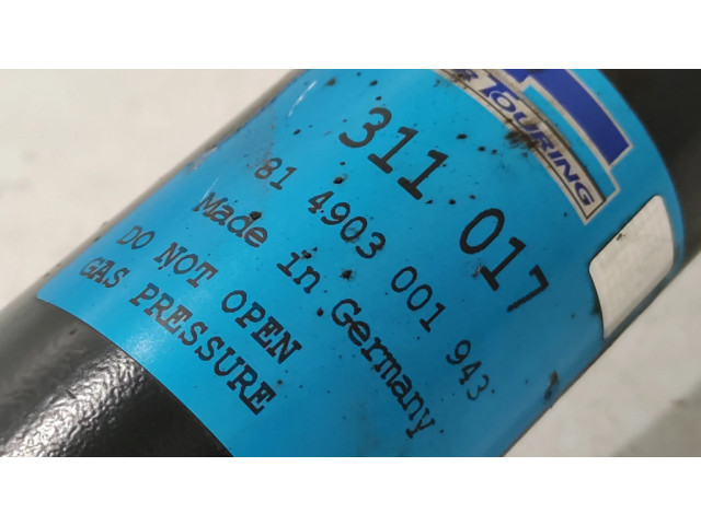 Передний амортизатор с пружиной      