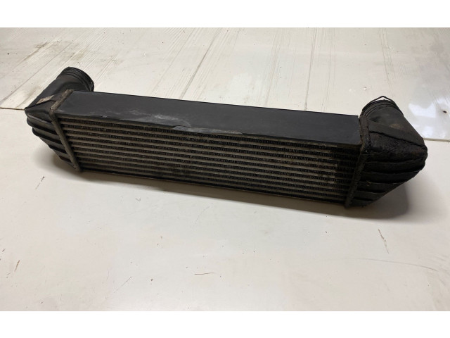 Радиатор интеркулера       BMW X3 E83  2003 - 2010 года   