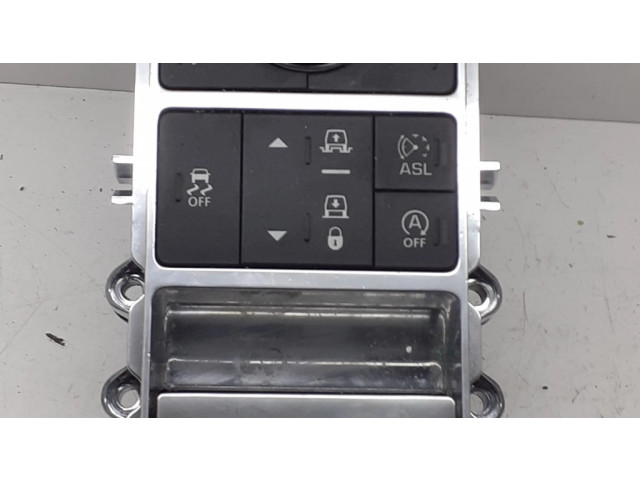 Включатель регулировки высоты / жесткости ходовой части