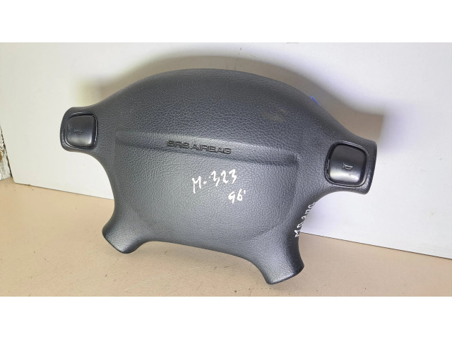 Подушка безопасности водителя T93013A, BC5A57K00 Mazda 323