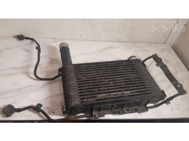 Интеркулер 1271001510, MR571357 Mitsubishi Pajero Sport I 2.5