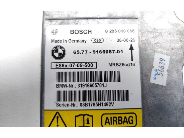 Блок подушек безопасности 9166057, 0285010066   BMW 1 E81 E87