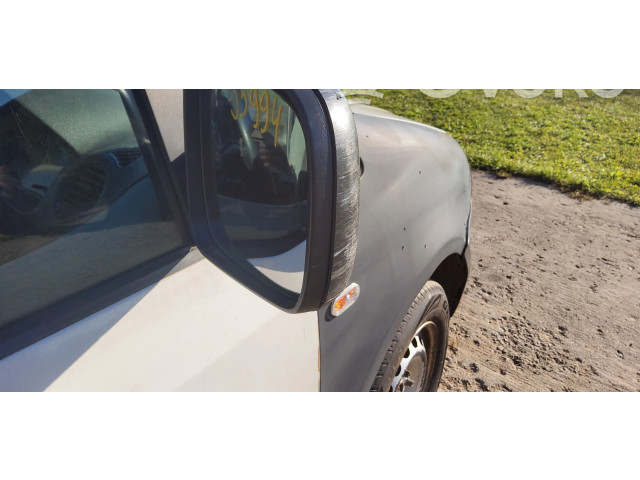 Zpětné zrcátko Volkswagen Caddy 2010 E1010718, 65608811