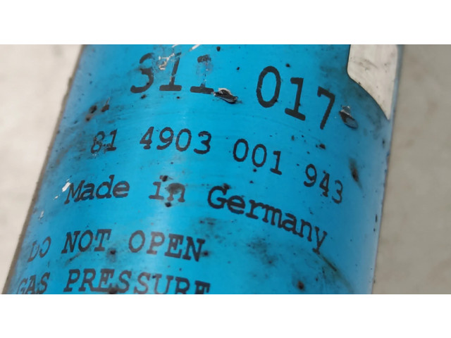 Передний амортизатор с пружиной      