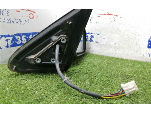 Zpětné zrcátko  Nissan Primera 1999    