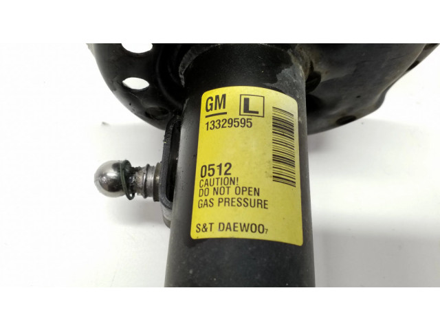 Передний амортизатор с пружиной      