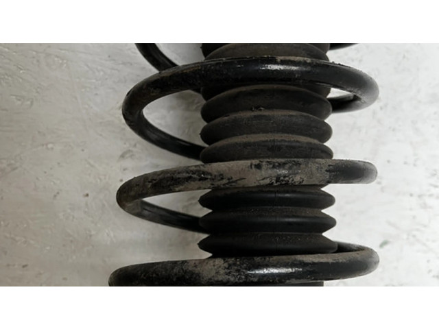 Передний амортизатор