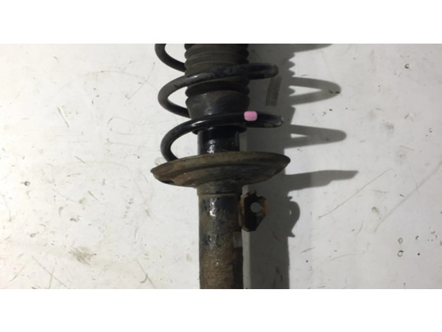 Передний амортизатор с пружиной      