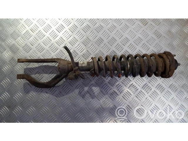 Передний амортизатор