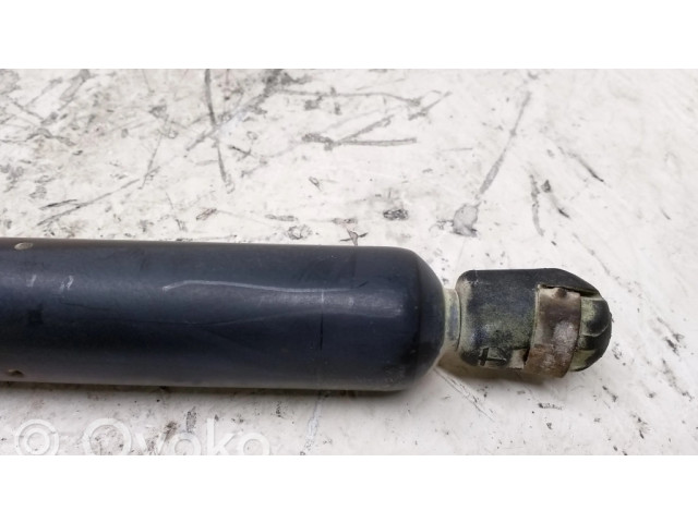 Амортизатор задней крышки