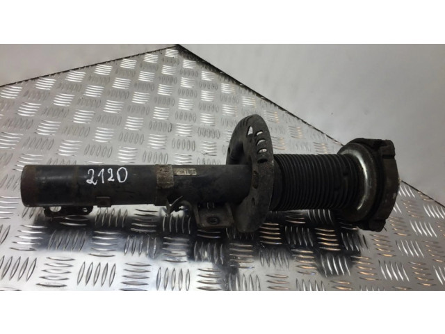 Передний амортизатор