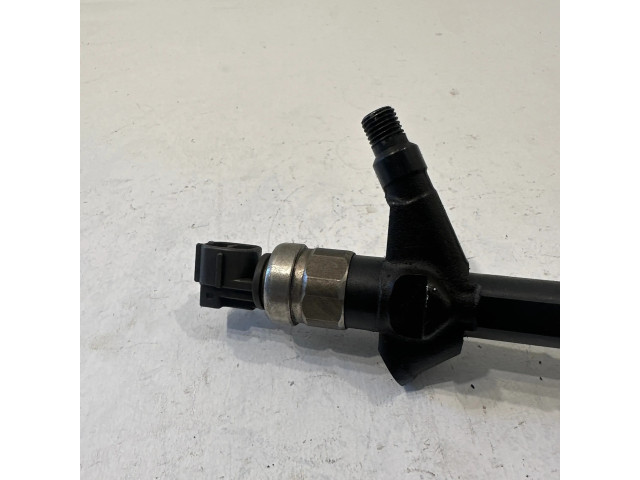 Vstřikovač AW402AW4, 03F23A39 Nissan X-Trail T30 pro naftový motor 2.2