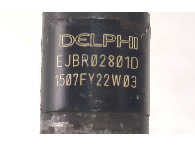 Vstřikovač 338014X500 KIA Carnival 00