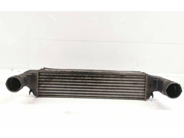 Интеркулер  77897930   BMW X3 E83 
