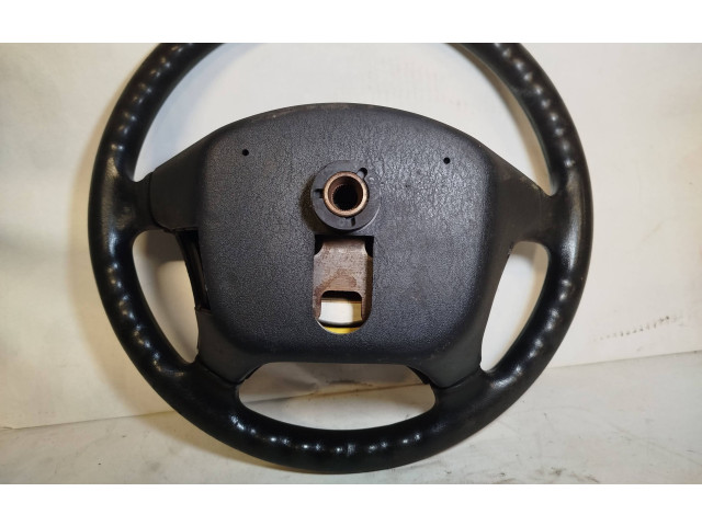 Руль Mitsubishi Carisma 1996 - 1999 года MR740922, 570217300