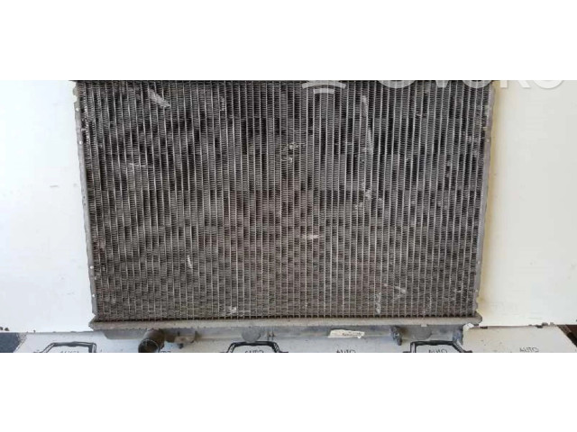 Радиатор охлаждающей жидкости Mitsubishi Carisma 2000 - 2004 года