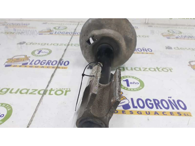 Передний амортизатор