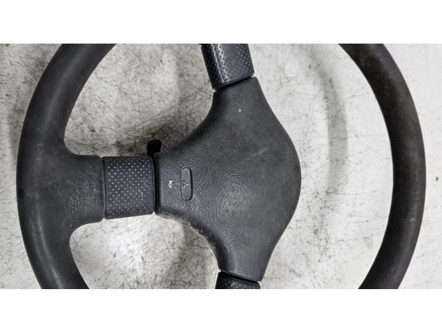 Руль Mitsubishi Colt 1989-1992 года MB564540, 0509