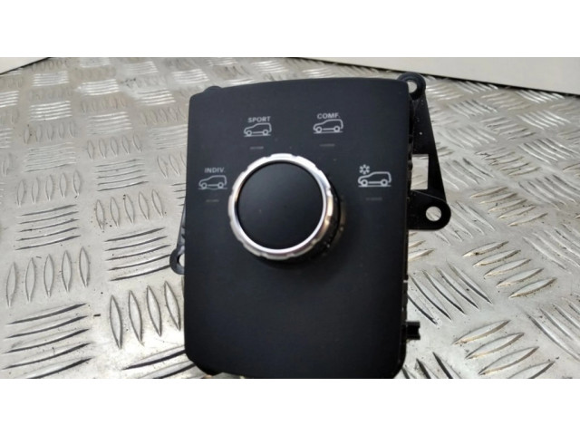 Включатель регулировки высоты / жесткости ходовой части